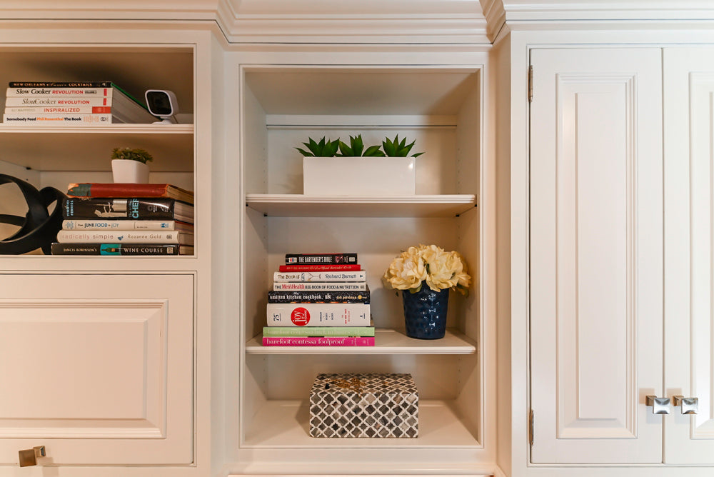 Traditional White Kitchen with Island, Appliances and Marble Countertops