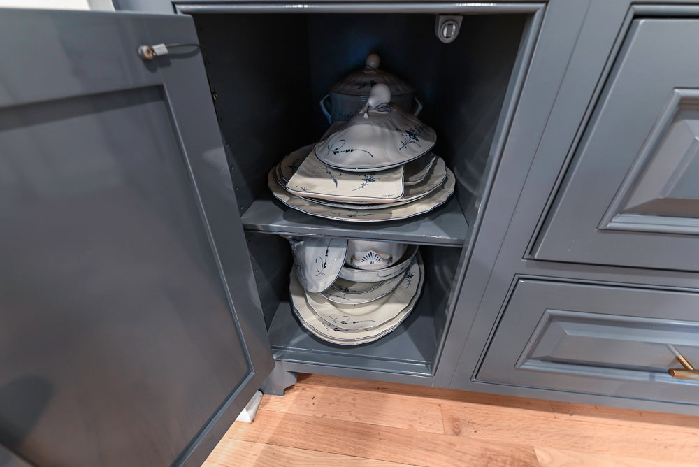Traditional White Kitchen with Island, Appliances and Marble Countertops
