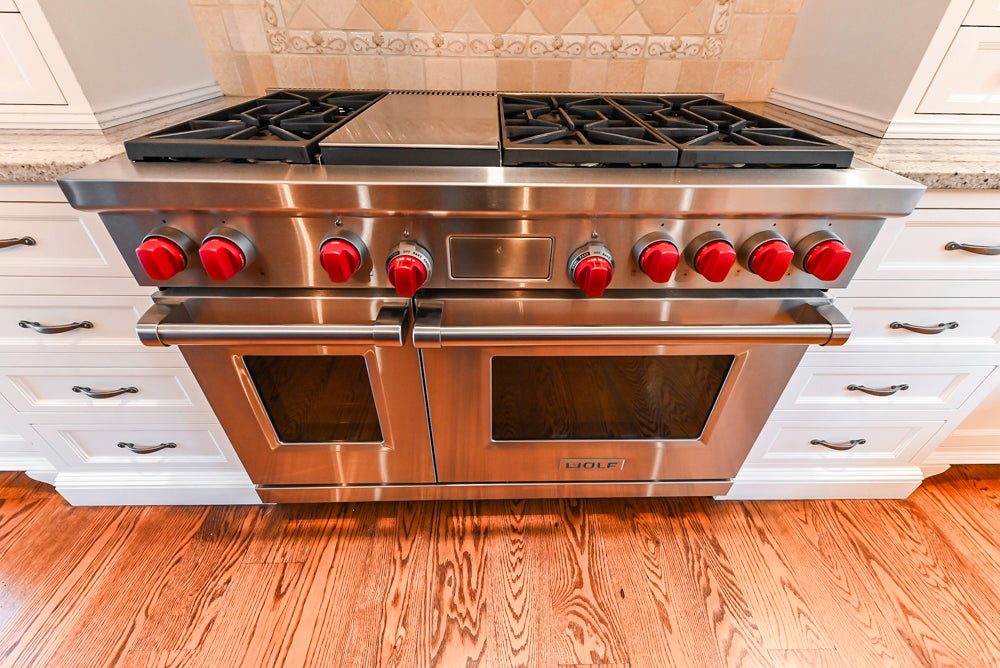 Traditional White Kitchen with Chestnut Brown Island, Desk Area & Appliances