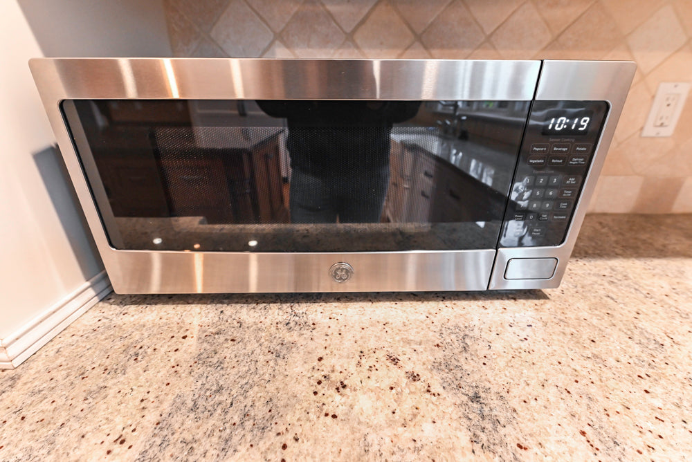 Traditional White Kitchen with Chestnut Brown Island, Desk Area & Appliances