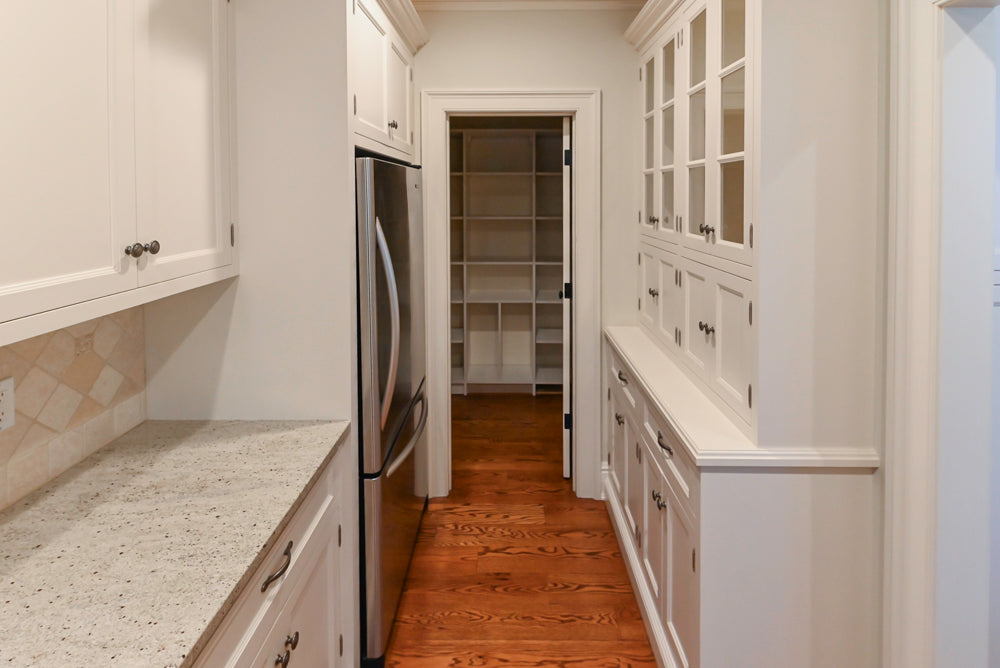 Traditional White Butler's Pantry with Light Granite Countertops