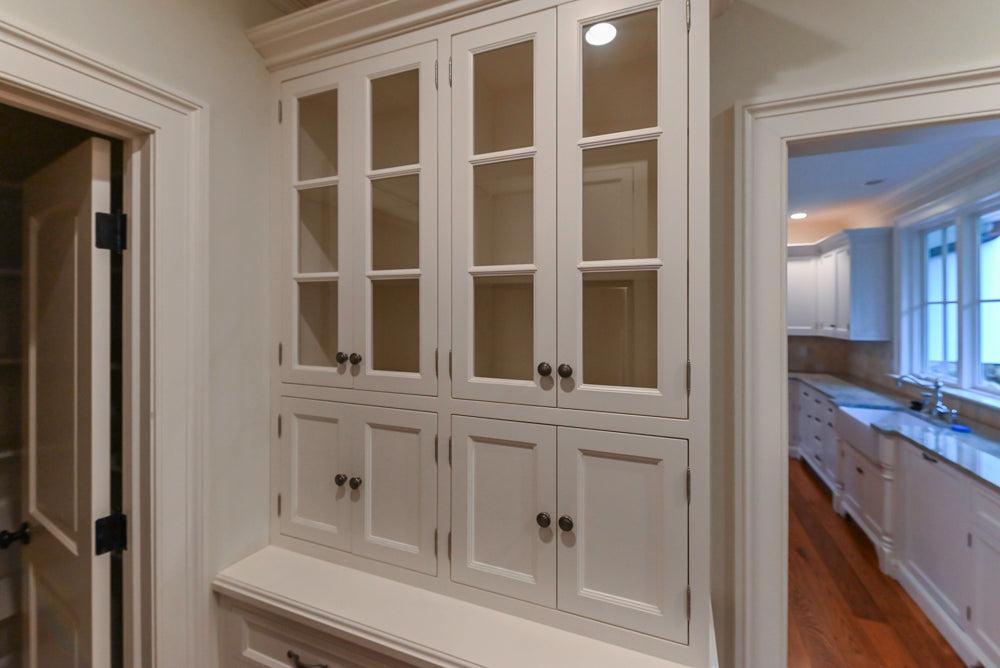 Traditional White Butler's Pantry with Granite Countertops