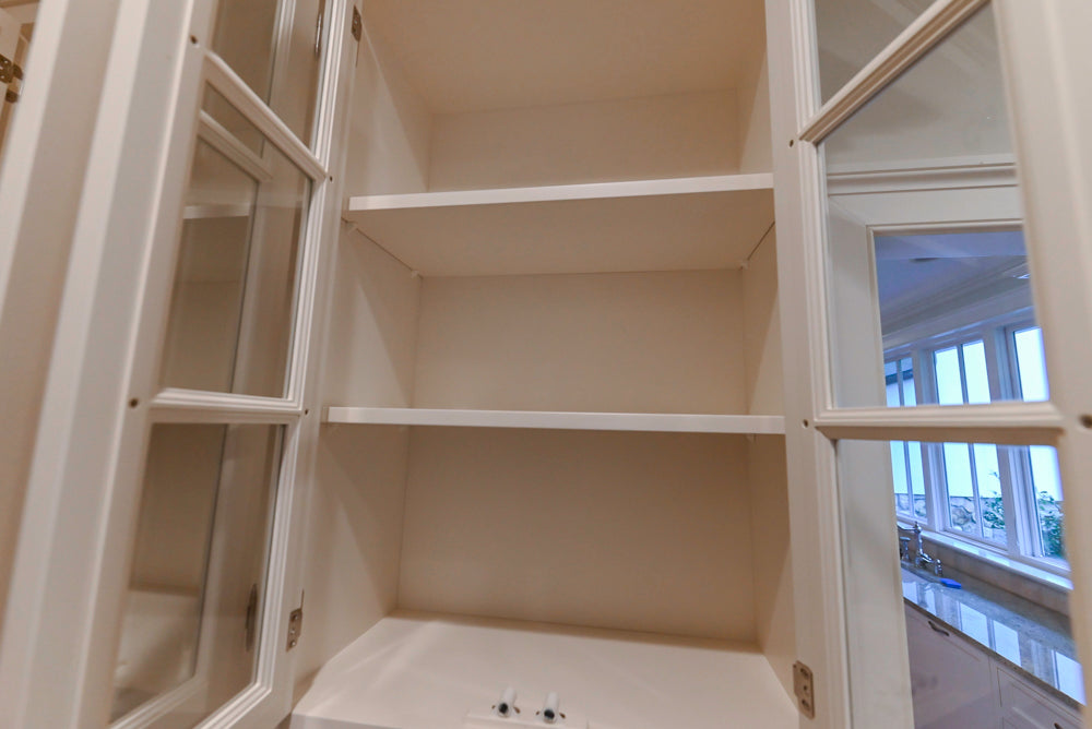 Traditional White Butler's Pantry with Granite Countertops