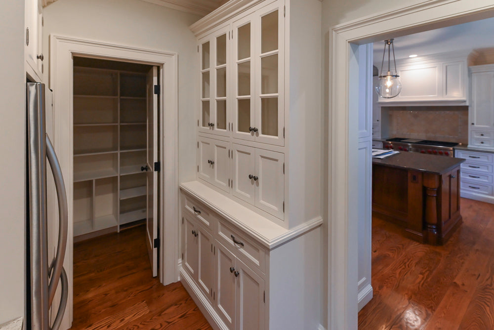 Traditional White Butler's Pantry with Light Granite Countertops