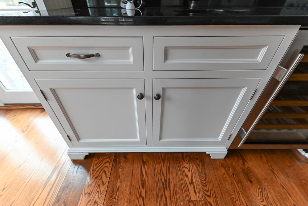 Traditional White Wet Bar Area with Black Granite Countertops