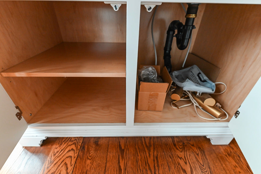 Traditional White Wet Bar Area with Black Granite Countertops