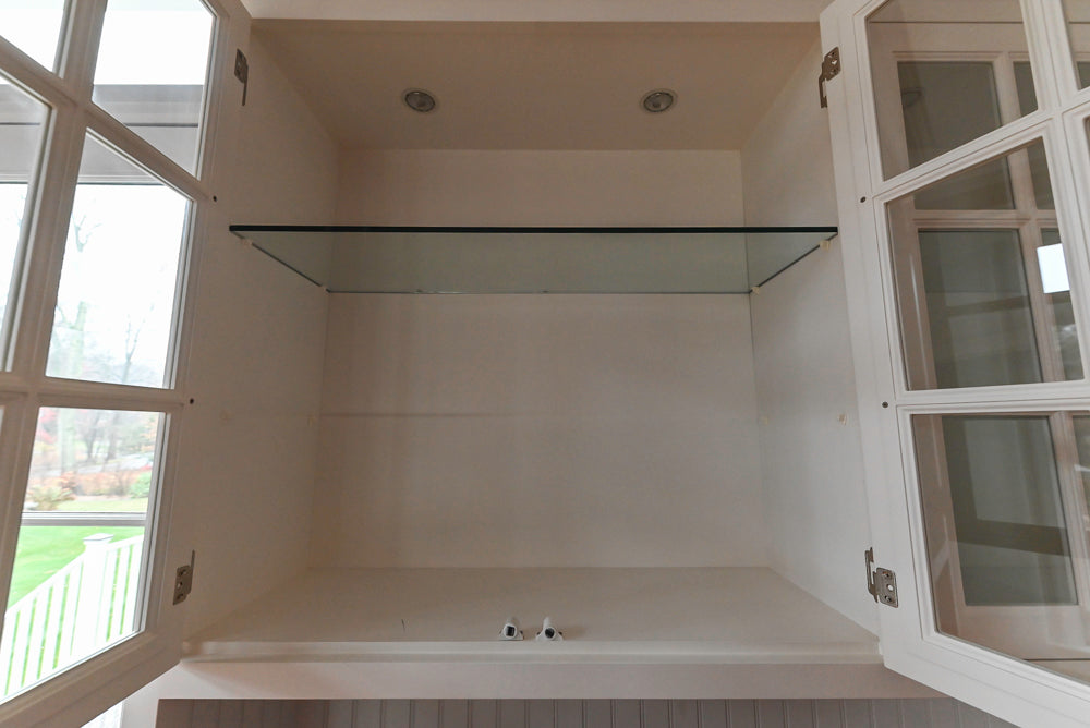 Traditional White Wet Bar Area with Black Granite Countertops