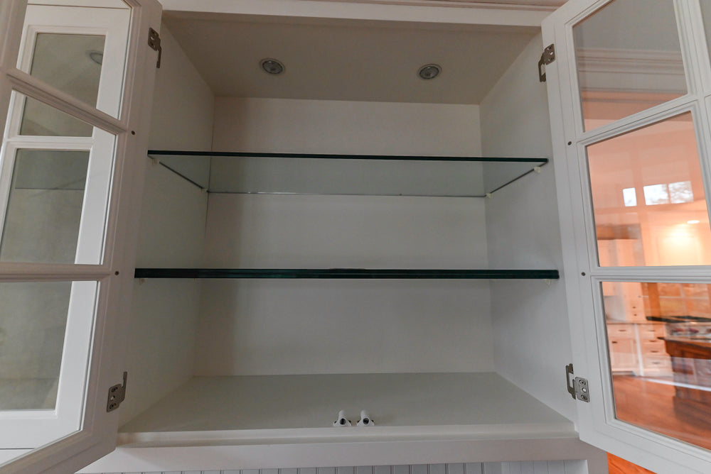 Traditional White Wet Bar Area with Black Granite Countertops