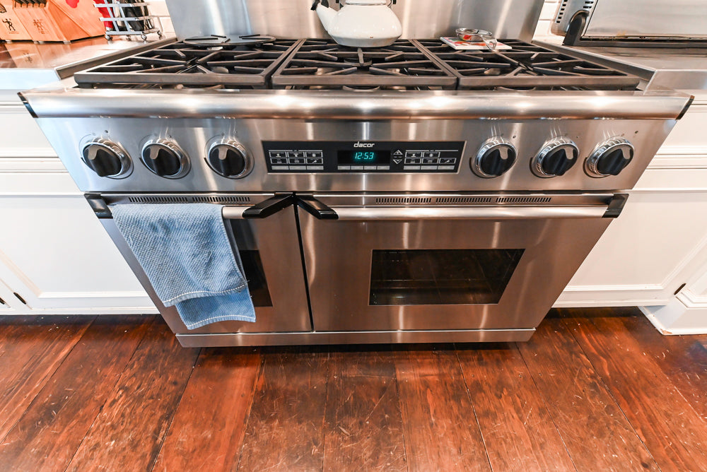 Craft-Maid Custom Cabinetry Traditional White Kitchen with Grey Island and Appliances
