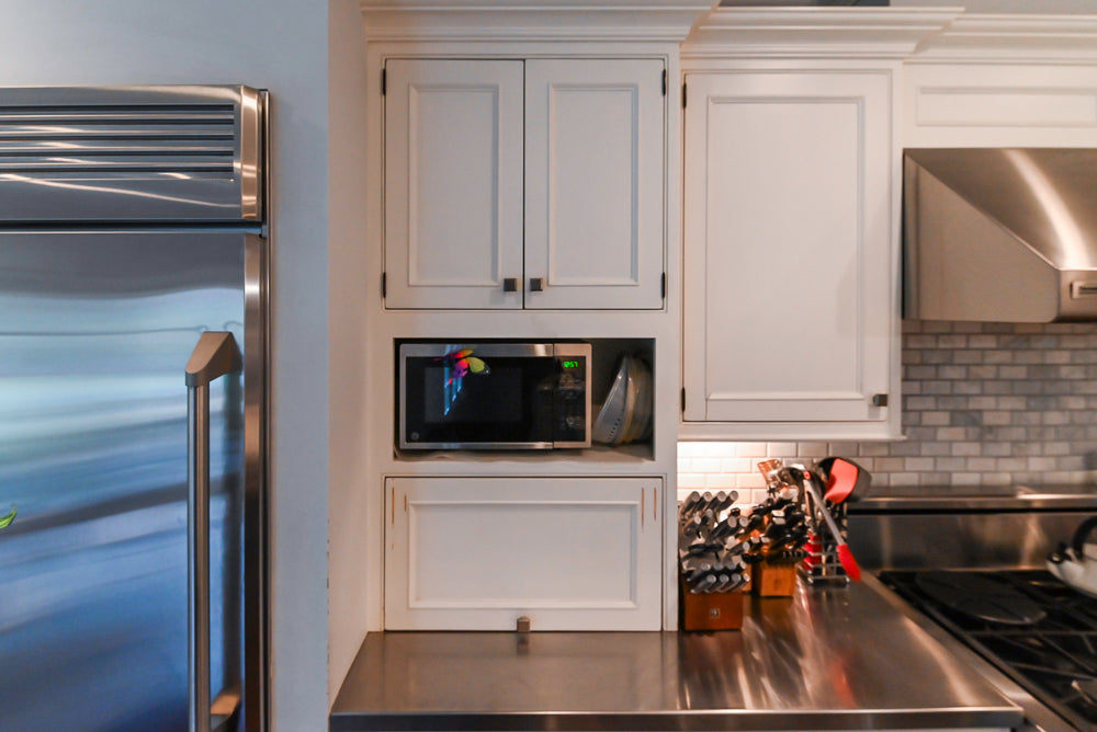 Craft-Maid Custom Cabinetry Traditional White Kitchen with Grey Island and Appliances