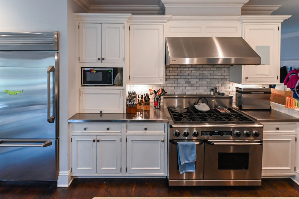 Craft-Maid Custom Cabinetry Traditional White Kitchen with Grey Island and Appliances