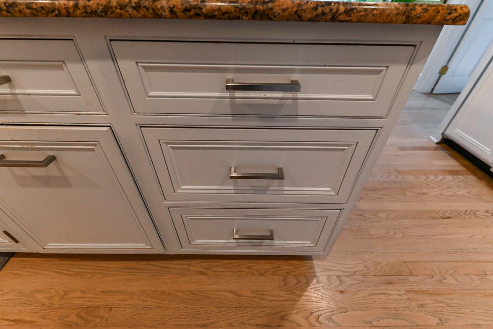 Traditional White Kitchen with Island, Granite Countertops & High-End Appliances
