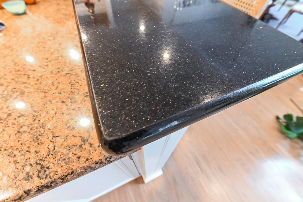 Traditional White Kitchen with Island, Granite Countertops & High-End Appliances