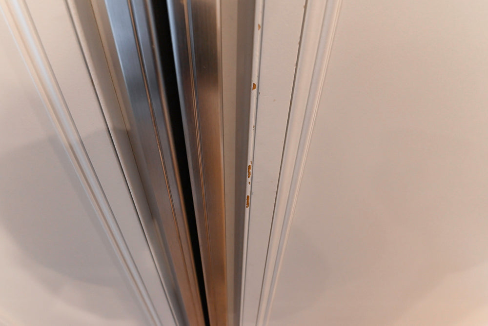 Traditional White Kitchen with Island, Granite Countertops & High-End Appliances