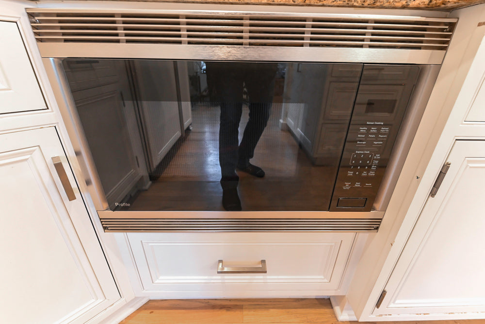 Traditional White Kitchen with Island, Granite Countertops & High-End Appliances