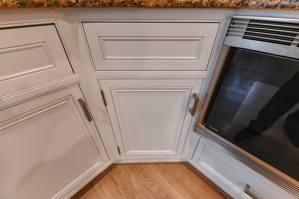 Traditional White Kitchen with Island, Granite Countertops & High-End Appliances