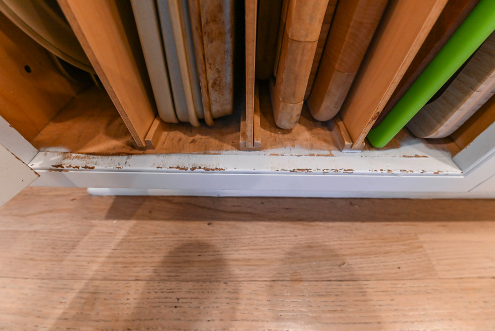 Traditional White Kitchen with Island, Granite Countertops & High-End Appliances