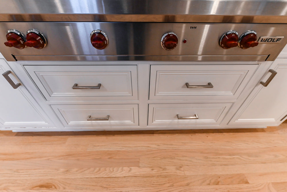 Traditional White Kitchen with Island, Granite Countertops & High-End Appliances