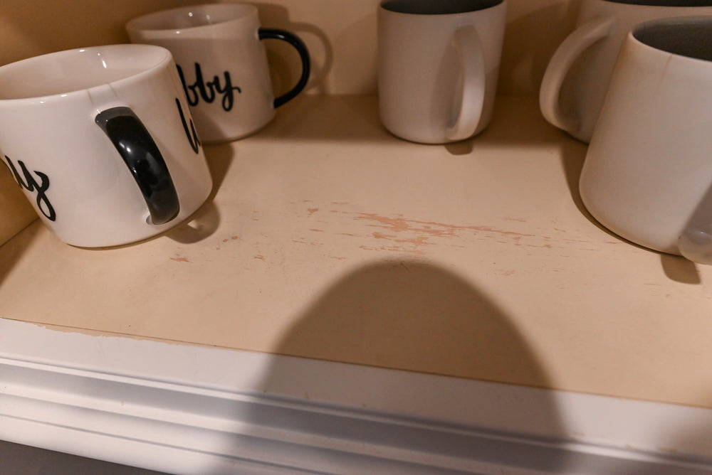 Traditional White Kitchen with Island, Granite Countertops & High-End Appliances