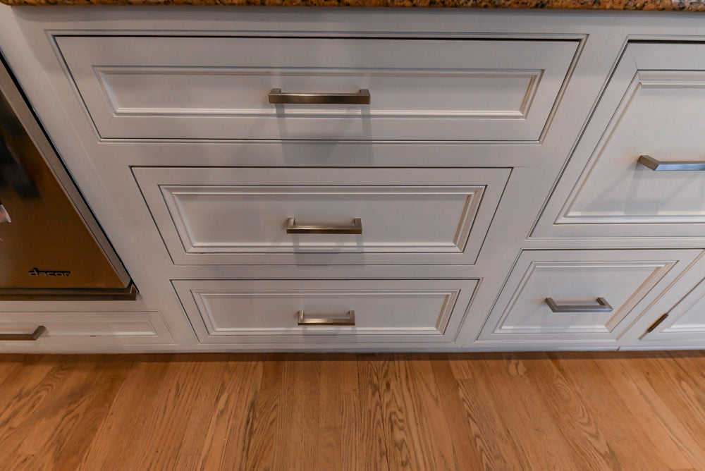 Traditional White Kitchen with Island, Granite Countertops & High-End Appliances