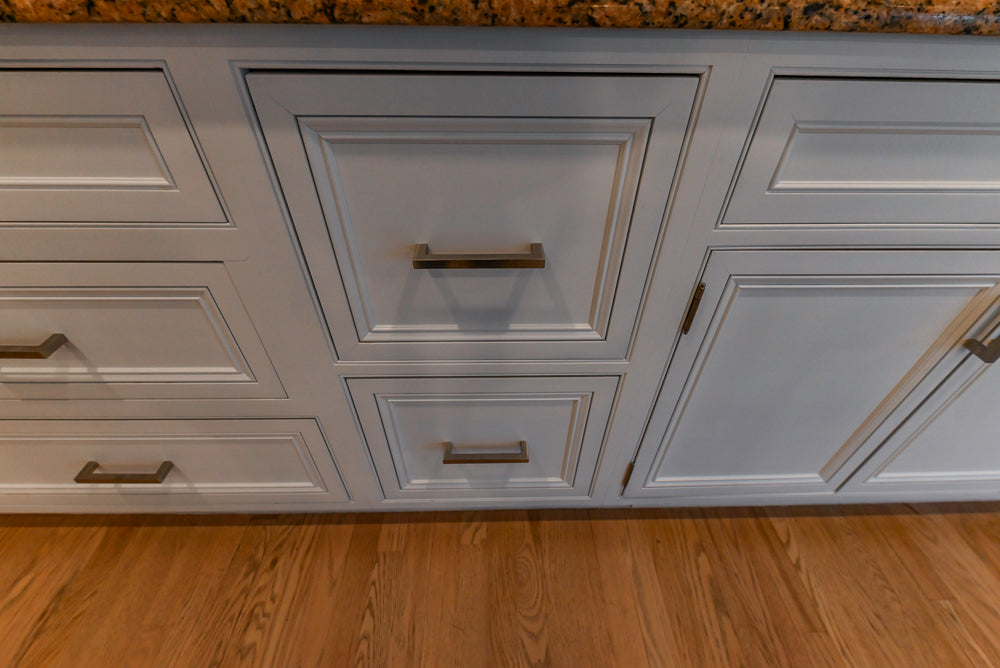 Traditional White Kitchen with Island, Granite Countertops & High-End Appliances