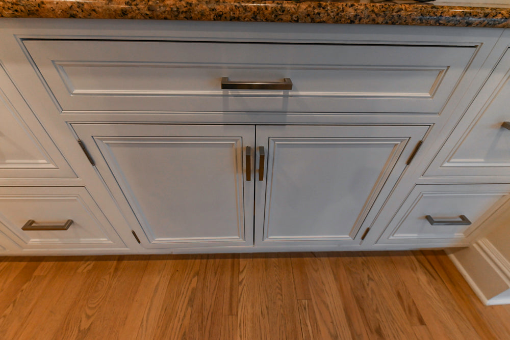 Traditional White Kitchen with Island, Granite Countertops & High-End Appliances