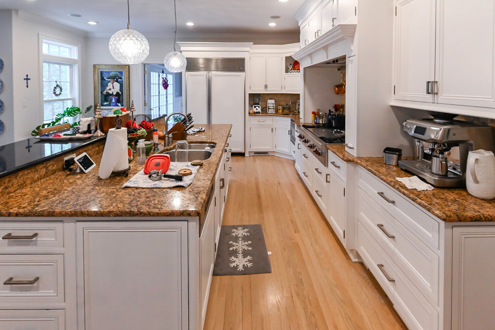 Traditional White Kitchen with Island, Granite Countertops and High-End Appliances