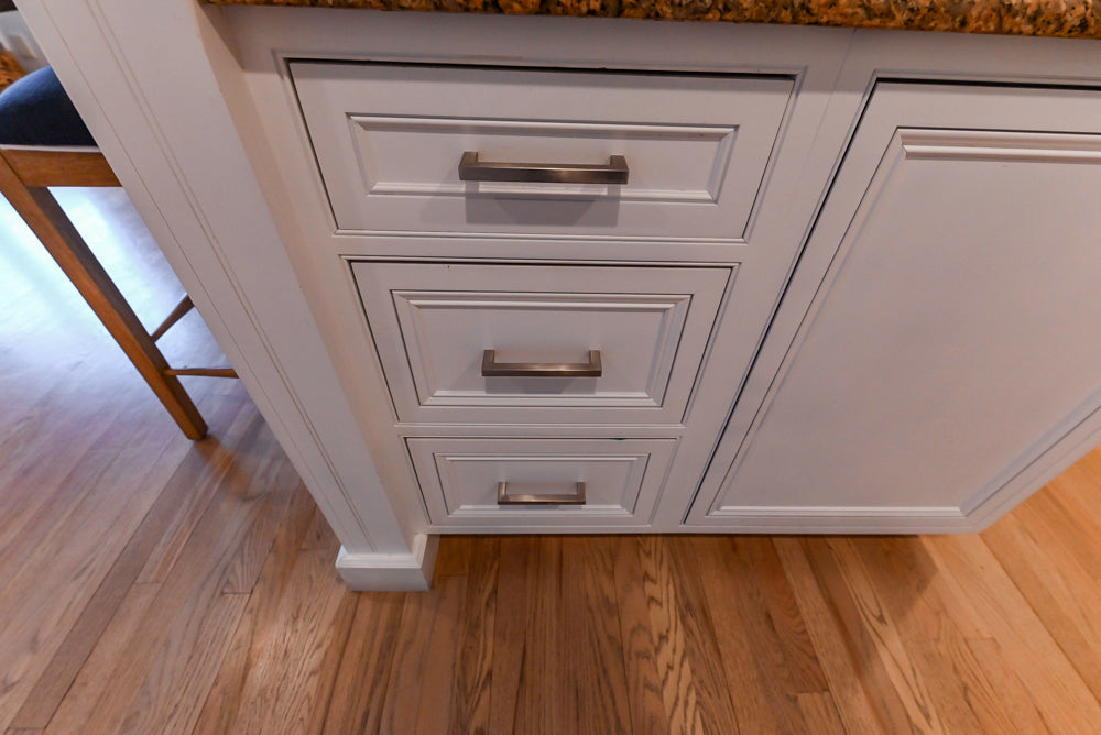 Traditional White Kitchen with Island, Granite Countertops & High-End Appliances