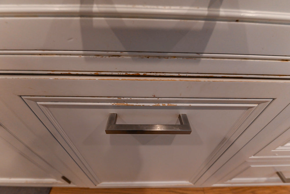 Traditional White Kitchen with Island, Granite Countertops & High-End Appliances