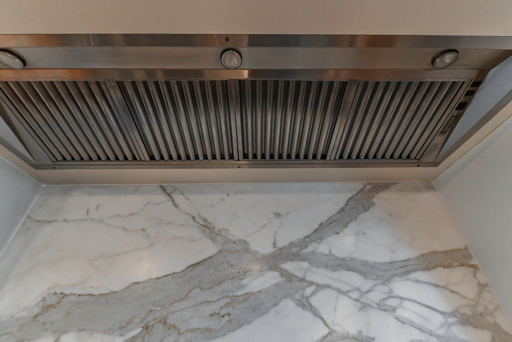 Traditional White Kitchen with Marble Top Island, Desk Area & Luxe Appliances