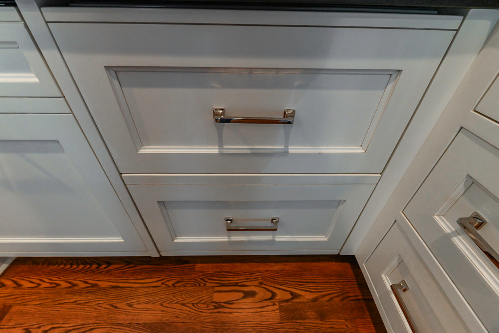 Traditional White Kitchen with Marble Top Island, Desk Area & Luxe Appliances