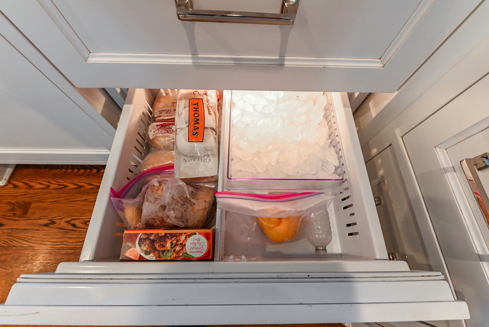 Traditional White Kitchen with Marble Top Island, Desk Area & Luxe Appliances