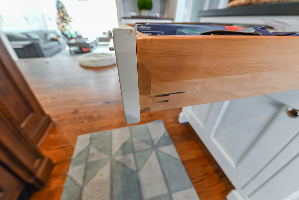 Traditional White Kitchen with Marble Top Island, Desk Area & Luxe Appliances