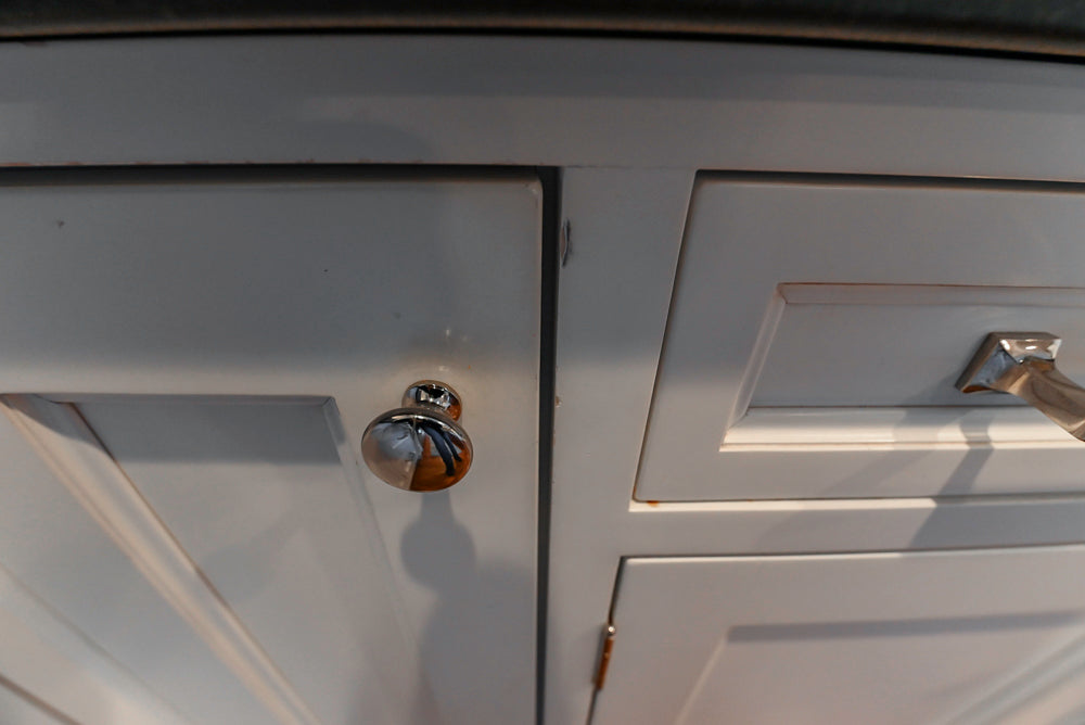 Traditional White Kitchen with Marble Top Island, Desk Area & Luxe Appliances