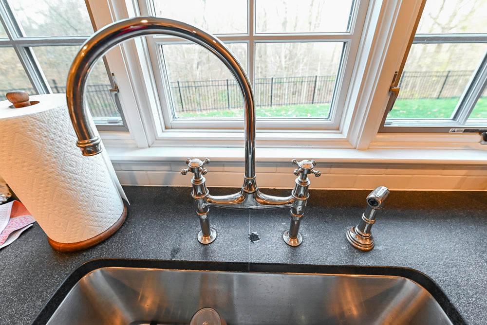 Traditional White Kitchen with Marble Top Island, Desk Area & Luxe Appliances