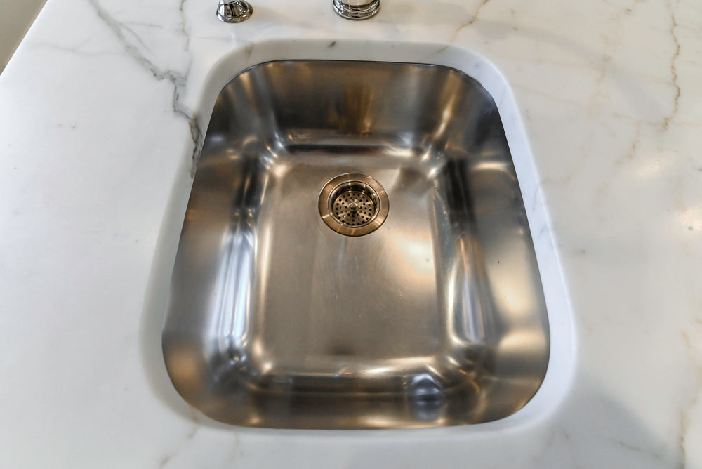 Traditional White Kitchen with Marble Top Island, Desk Area & Luxe Appliances