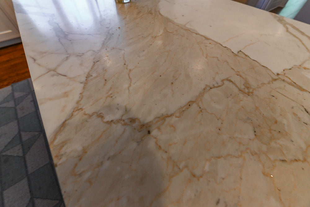 Traditional White Kitchen with Marble Top Island, Desk Area & Luxe Appliances