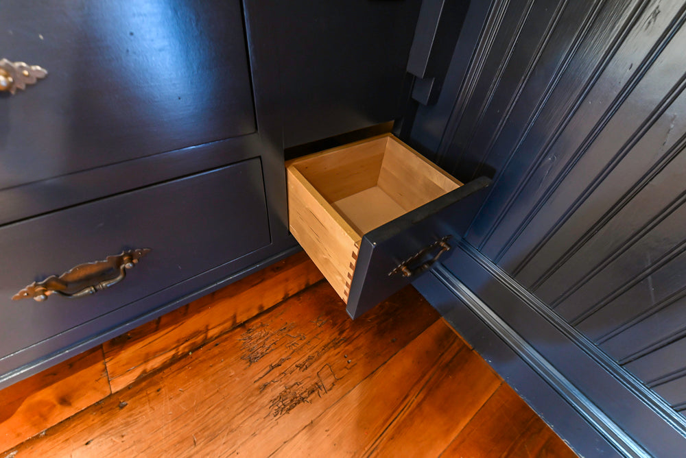 Rustic Traditional White & Navy Kitchen with Black AGA Range, Wood Top Island & Soapstone Countertops