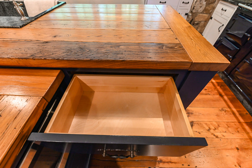 Rustic Traditional White & Navy Kitchen with Black AGA Range, Wood Top Island & Soapstone Countertops