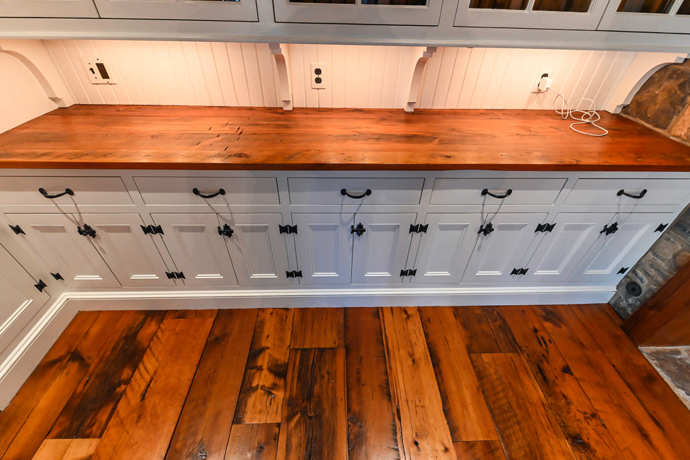 Rustic Traditional White & Navy Kitchen with Black AGA Range, Wood Top Island & Soapstone Countertops