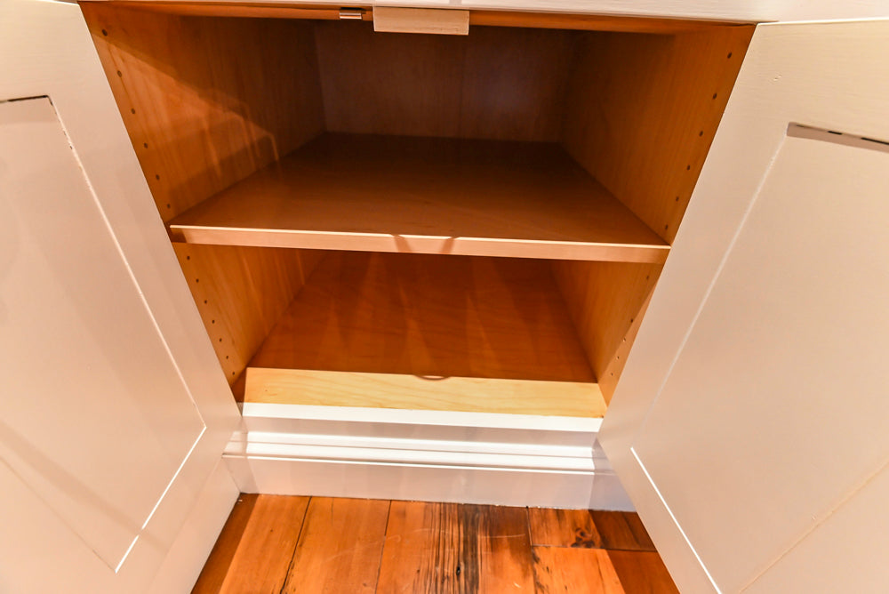 Rustic Traditional White & Navy Kitchen with Black AGA Range, Wood Top Island & Soapstone Countertops