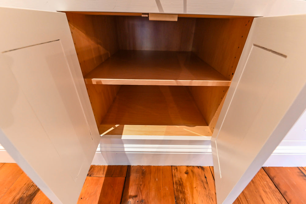 Rustic Traditional White & Navy Kitchen with Black AGA Range, Wood Top Island & Soapstone Countertops