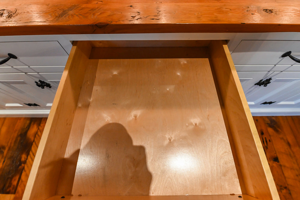 Rustic Traditional White & Navy Kitchen with Black AGA Range, Wood Top Island & Soapstone Countertops