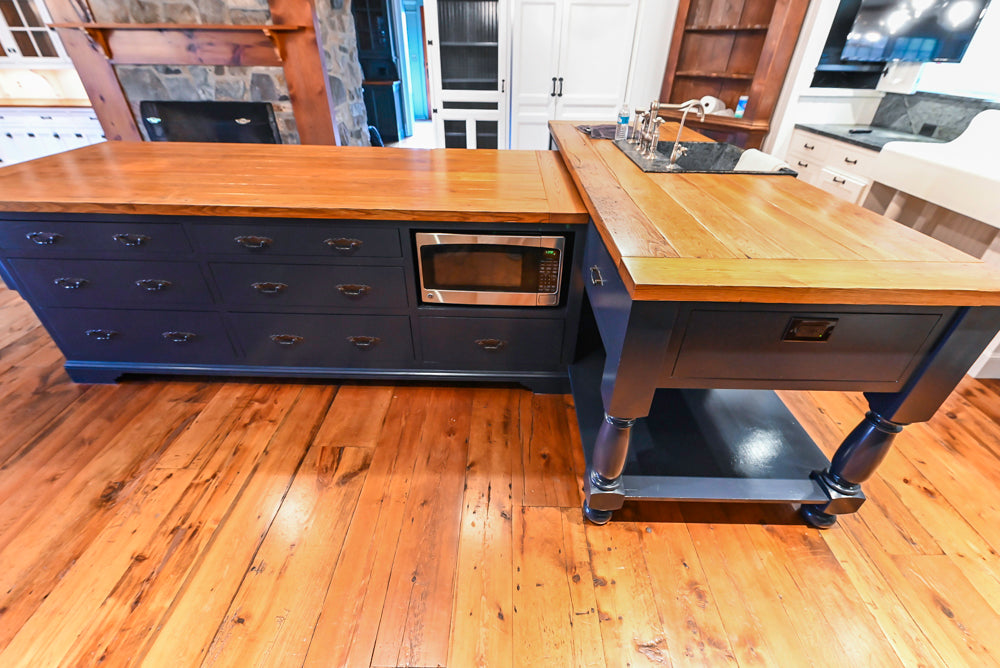 Rustic Traditional White & Navy Kitchen with Black AGA Range, Wood Top Island & Soapstone Countertops