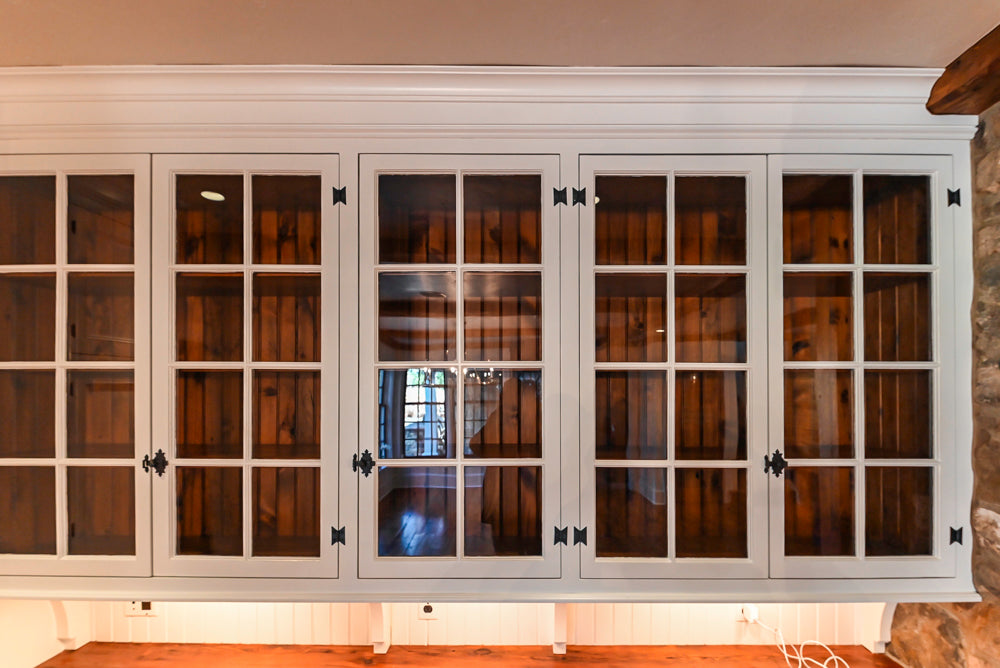 Rustic Traditional White & Navy Kitchen with Black AGA Range, Wood Top Island & Soapstone Countertops