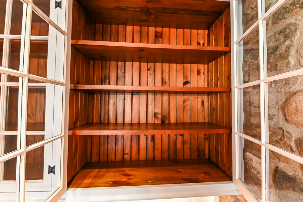 Rustic Traditional White & Navy Kitchen with Black AGA Range, Wood Top Island & Soapstone Countertops