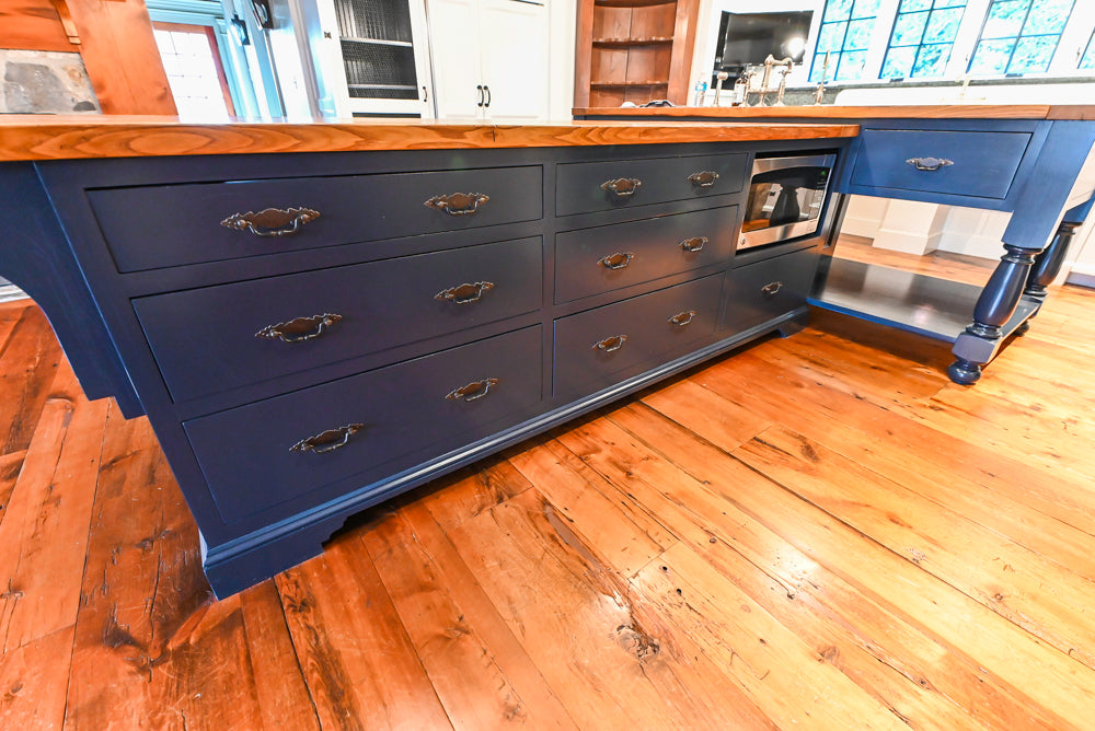 Rustic Traditional White & Navy Kitchen with Black AGA Range, Wood Top Island & Soapstone Countertops