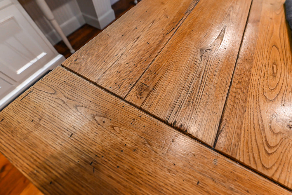 Rustic Traditional White & Navy Kitchen with Black AGA Range, Wood Top Island & Soapstone Countertops