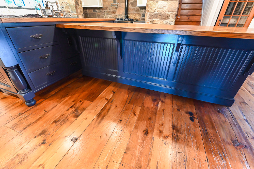Rustic Traditional White & Navy Kitchen with Black AGA Range, Wood Top Island & Soapstone Countertops