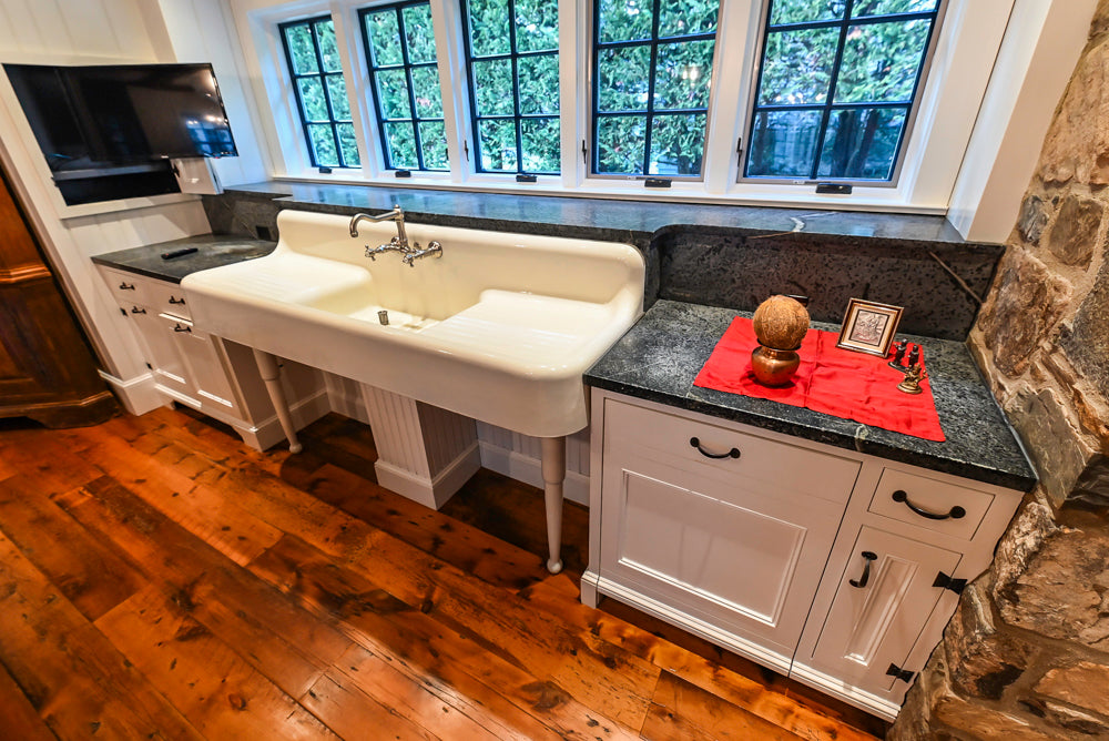Rustic Traditional White & Navy Kitchen with Black AGA Range, Wood Top Island & Soapstone Countertops